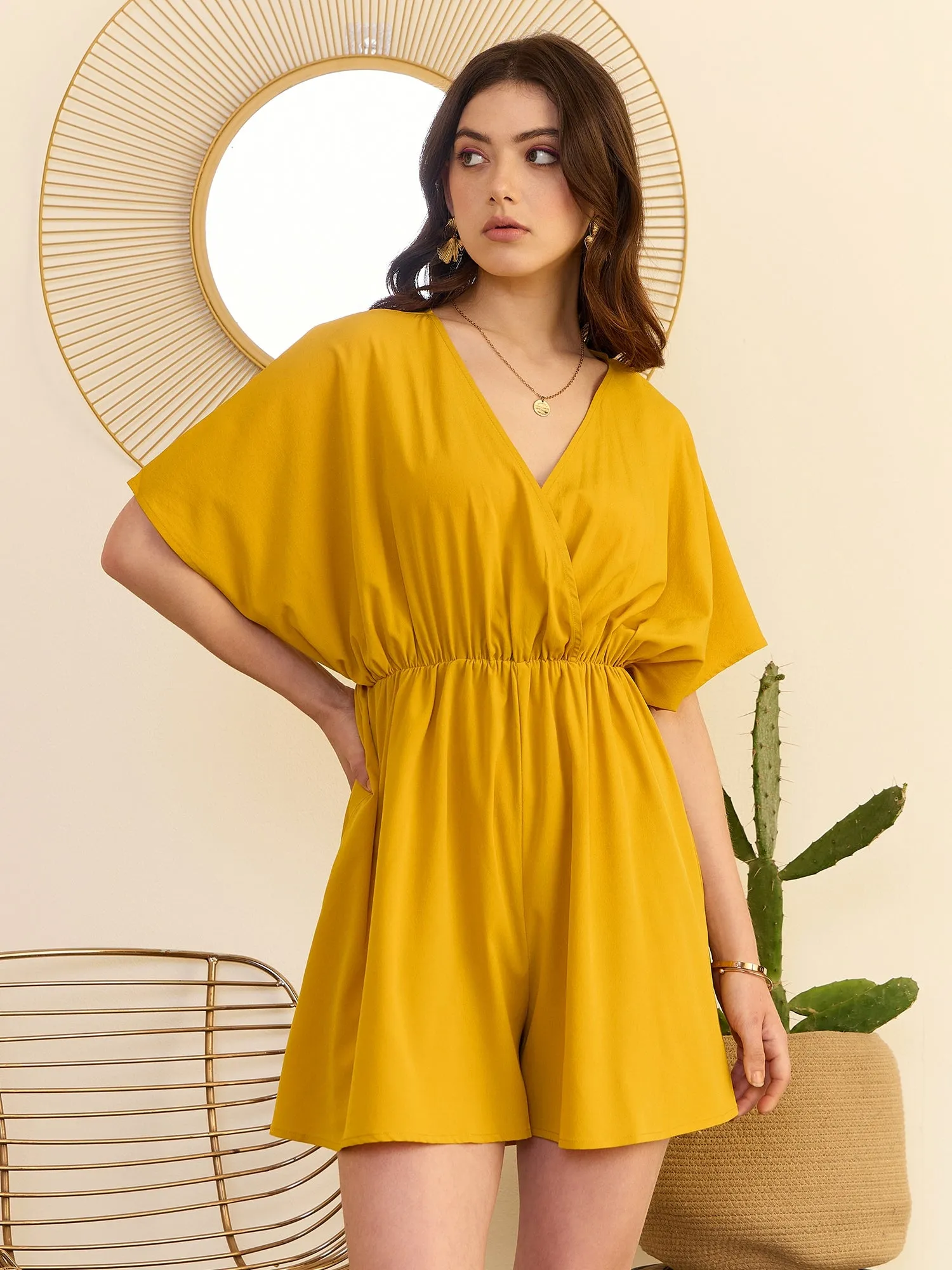 Berrylush Women Solid Yellow V-Neck Cape Sleeves Cinched Waist Wrap Mini Jumpsuit