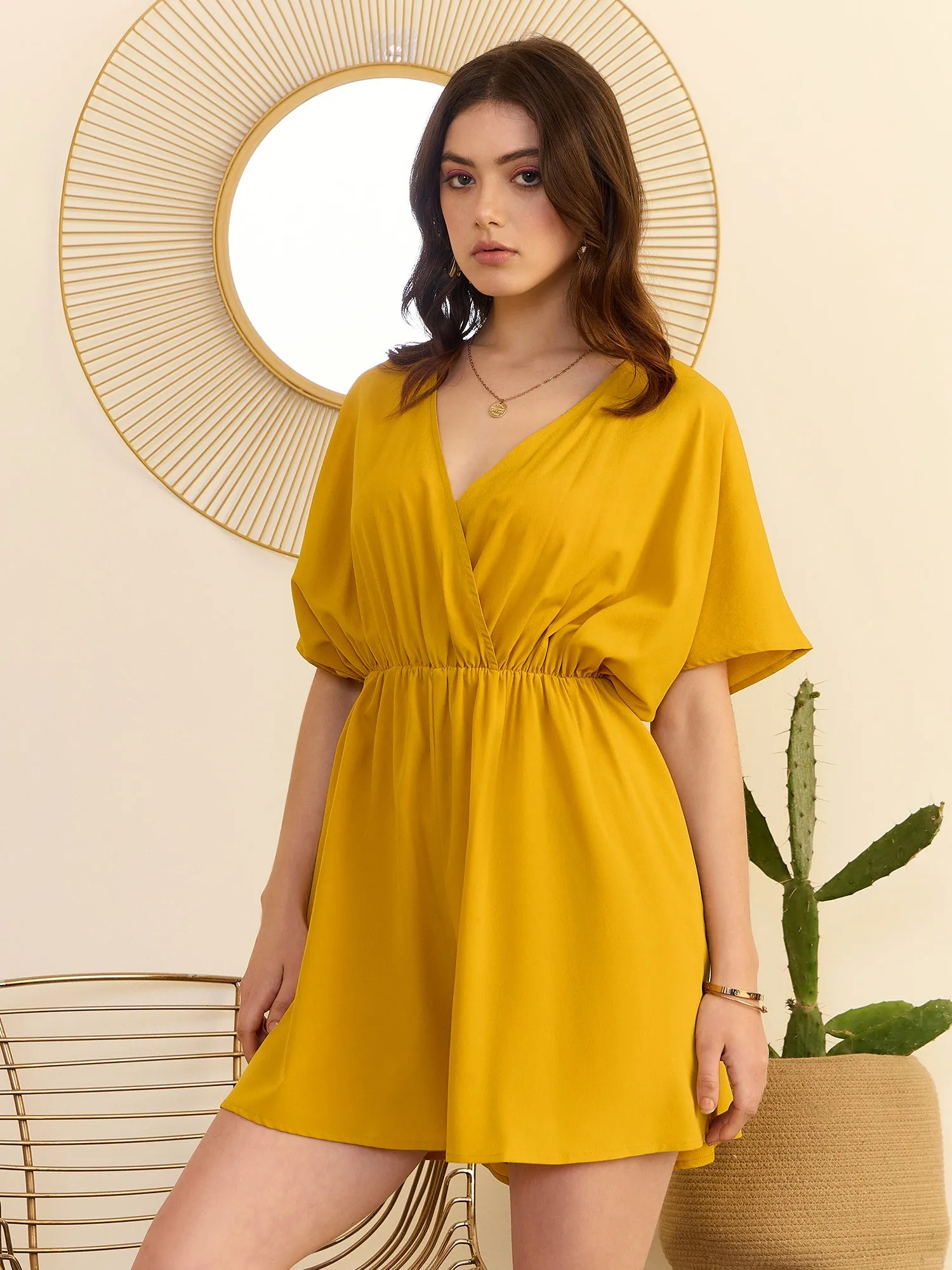 Berrylush Women Solid Yellow V-Neck Cape Sleeves Cinched Waist Wrap Mini Jumpsuit